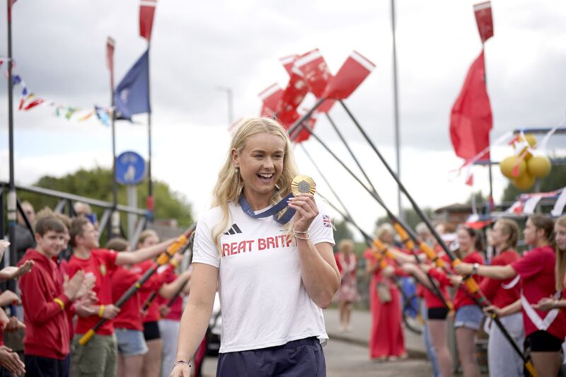 Members of Bann Rowing Club in Coleraine, Northern Ireland, welcome home Team GB women’s quadruple sculls gold medal winner, Hannah Scott