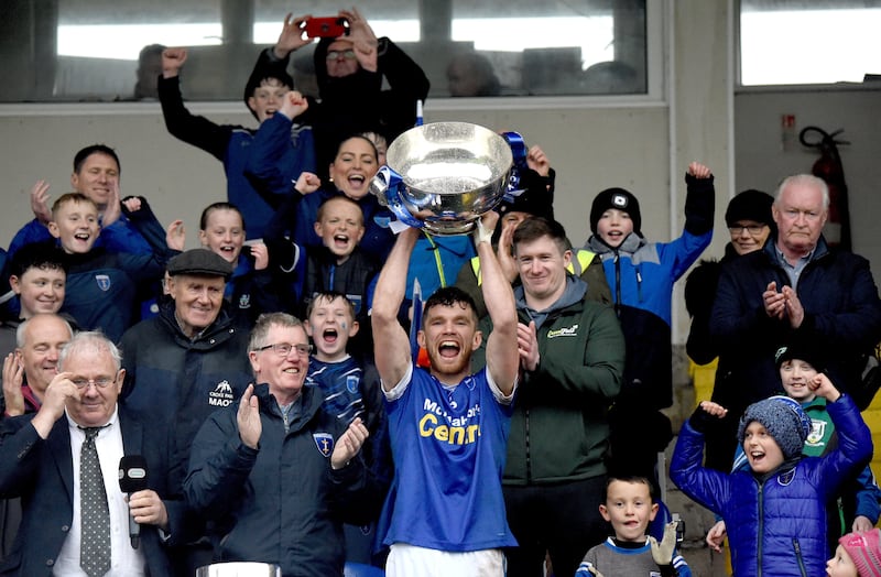 Scotstown captain Damien McArdle lifts the Mick Duffy cup after the Monaghan County Senior Club Football Championship final match between Clontibret O'Neills and Scotstown at St Tiernach's Park in Clones, Monaghan