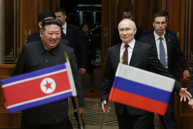 Russian President Vladimir Putin and North Korea’s leader Kim Jong Un smile during their meeting at the Pyongyang Sunan International Airport (Gavriil Grigorov/AP)