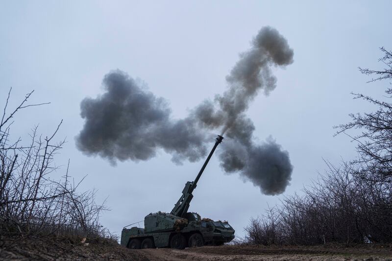 A Ukrainian brigade fires a self-propelled howitzer towards Russian front-line positions in the Donetsk region of eastern Ukraine (Evgeniy Maloletka/AP)