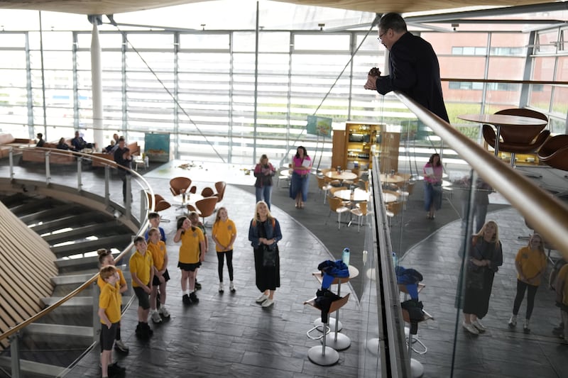 Prime Minister Sir Keir Starmer listens to a choir at the Senedd in Cardiff