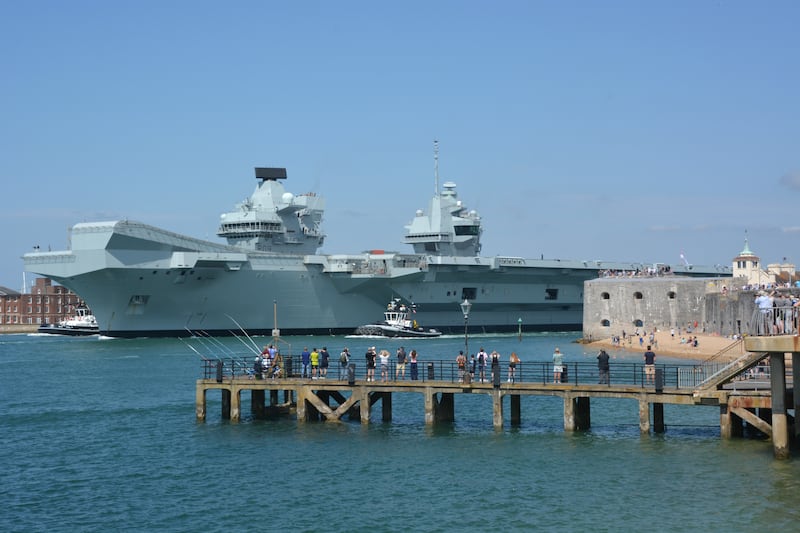 The Royal Navy aircraft carrier HMS Prince of Wales sets sail from Portsmouth Harbour