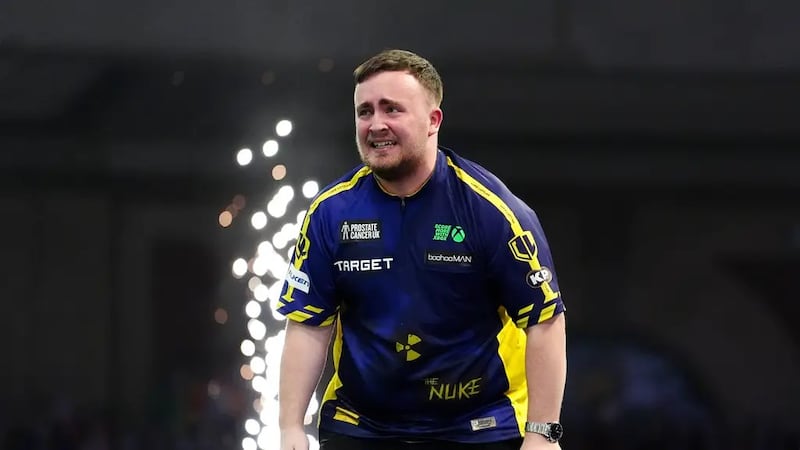 Luke Littler has become the youngest world champion ever after beating Michael van Gerwen (Zac Goodwin/PA)