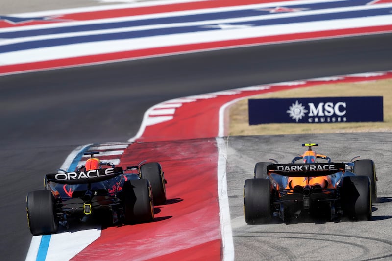 Norris (right) was adjudged to have gained an advantage by leaving the track (AP Photo/Eric Gay)