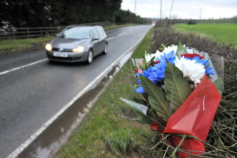 Alan Lewis- PhotopressBelfast.co.uk        27-12-2015.Flowers left this evening at the scene of the fatal collision in which seven year-old Jackson Turner died when three cars crashed at the Old Carrickfergus Road in Newtownabbey, Country Antrim last night.    Two vehicles were travelling towards Belfast and one was going towards Carrickfergus where young Jackson went to school.   The driver of the car in which Jackson died is in a serious condition in hospital. Five other people who were in the other two vehicles were treated for their injuries but their conditions are not believed to be life threatening.. 