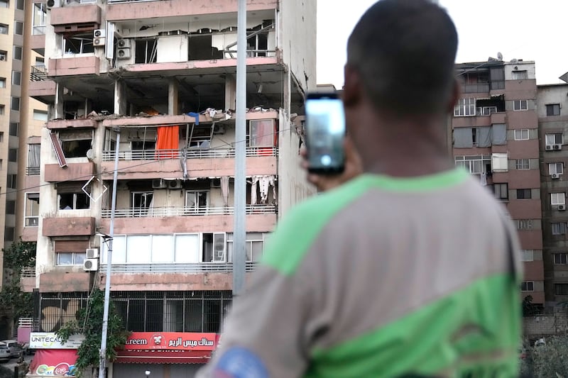 An apartment block damaged by an Israeli strike in Lebanon (Hussein Malla/AP)