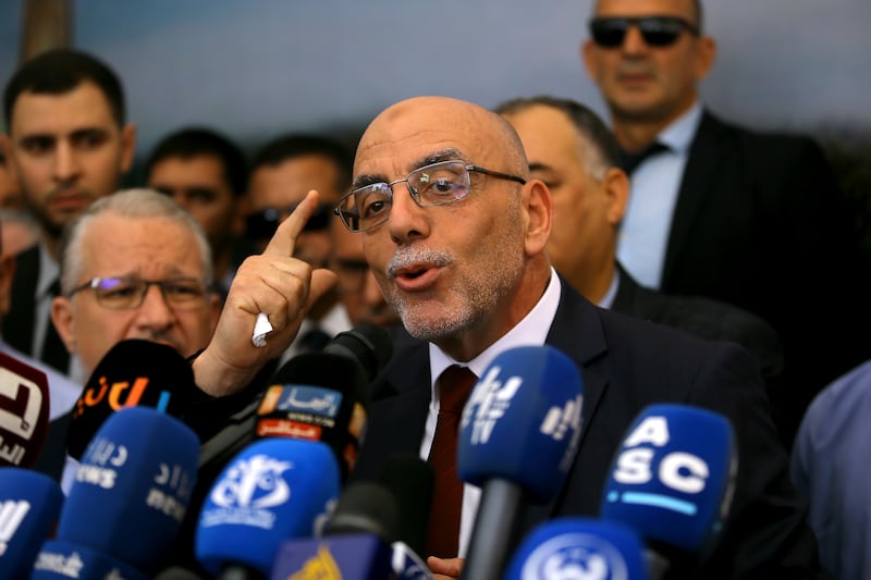 Abdelali Hassani Cherif, presidential candidate for the Movement of Society for Peace, addresses reporters in Algiers (Anis Belghoul/AP)