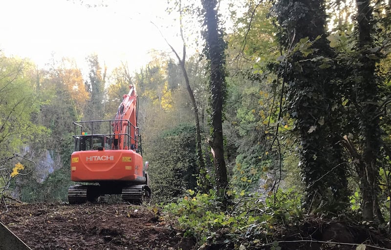 An excavator at a flooded quarry near to Benburb in Co Tyrone during a search for missing murder victim Charlotte Murray