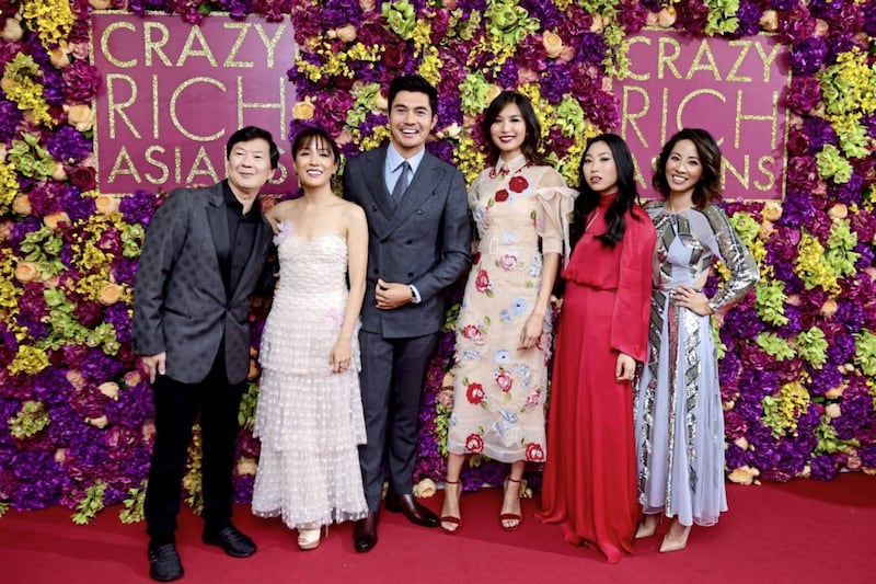 (From left to right) Ken Jeong, Constance Wu, Henry Golding, Gemma Chan, Awkwafina and Jing Lusi attending the Crazy Rich Asians Premiere in London. Picture by Ian West/PA Wire 