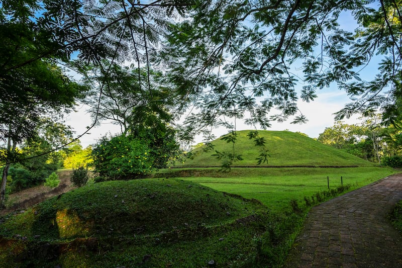 The mounds were built by north-east India’s Ahom dynasty in Assam state (Anupam Nath/AP)