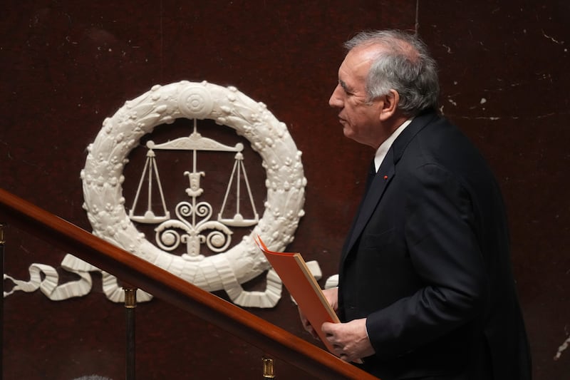 French prime minister Francois Bayrou arrives to deliver his general policy speech meant to outline his top priorities at the National Assembly in Paris (Thibault Camus/AP)