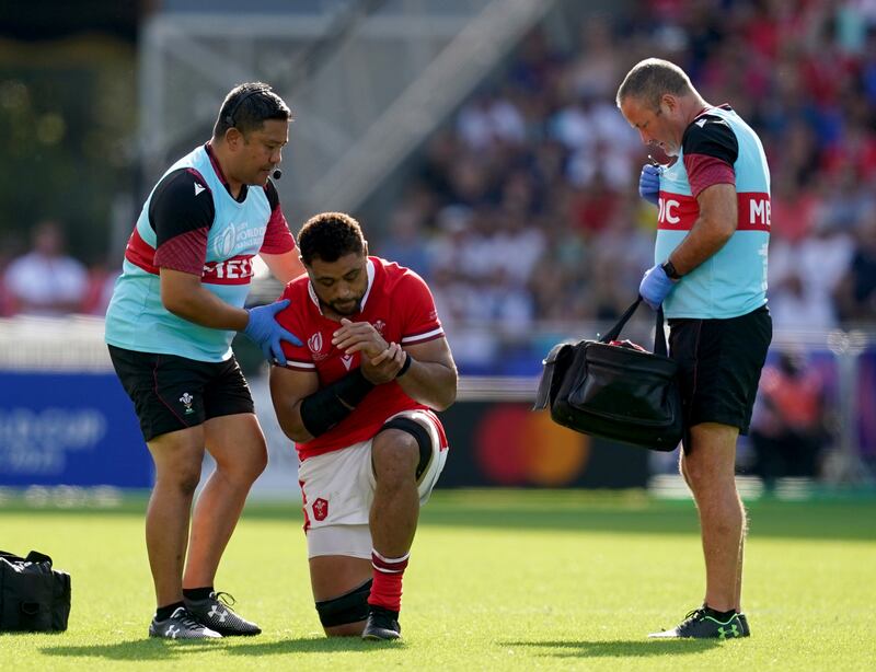 Taulupe Faletau suffered a broken arm against Georgia at the 2023 World Cup .