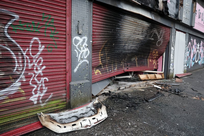 Damaged caused to a salon in North Street, Belfast when a van was rammed into it and set on fire. PICTURE: MAL MCCANN