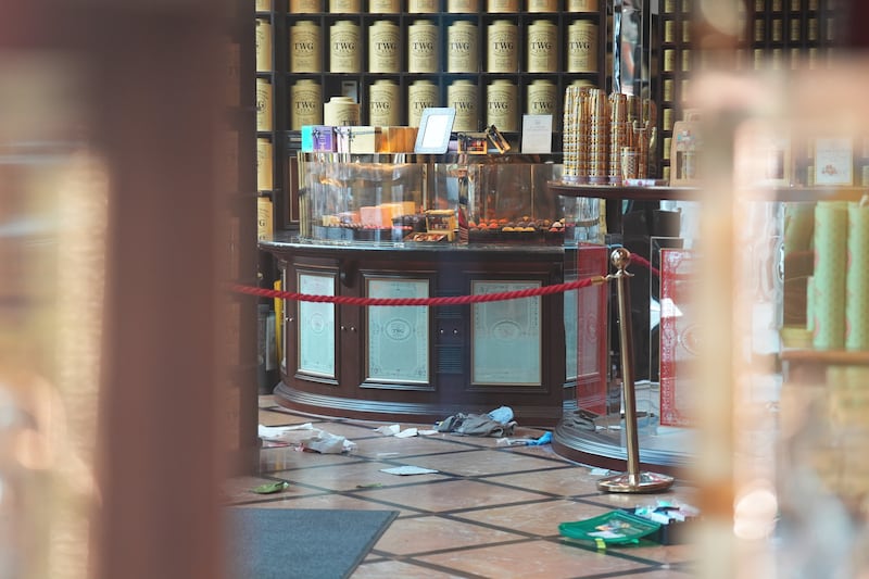 Discarded clothing and emergency medical equipment in the TWG Tea shop in Leicester Square, London, near where the incident took place