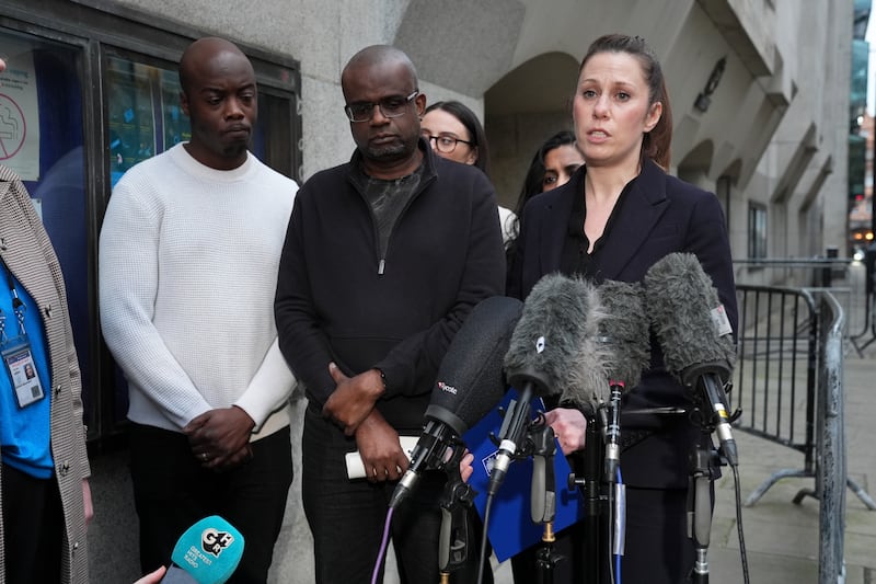 Michael Andam, centre, paid tribute to his daughter while speaking alongside Detective Chief Inspector Becky Woodsford, who led the murder investigation