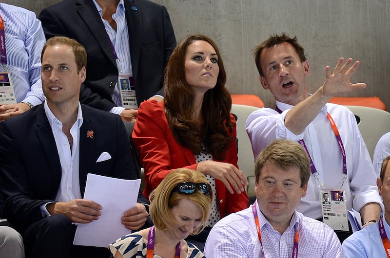 The then-Duke and Duchess of Cambridge with Culture Secretary Jeremy Hunt in the stands to watch the evening swimming session at the Aquatics Centre at the London Olympics
