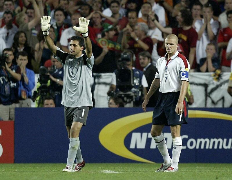 David Beckham looks dejected after missing a penalty against Portugal goalkeeper Ricardo