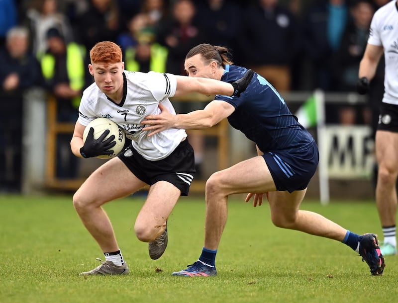 Omagh's Callum Daly and Killyclogher's Conall McCann battle it out in Carrickmore. Picture: Oliver McVeigh