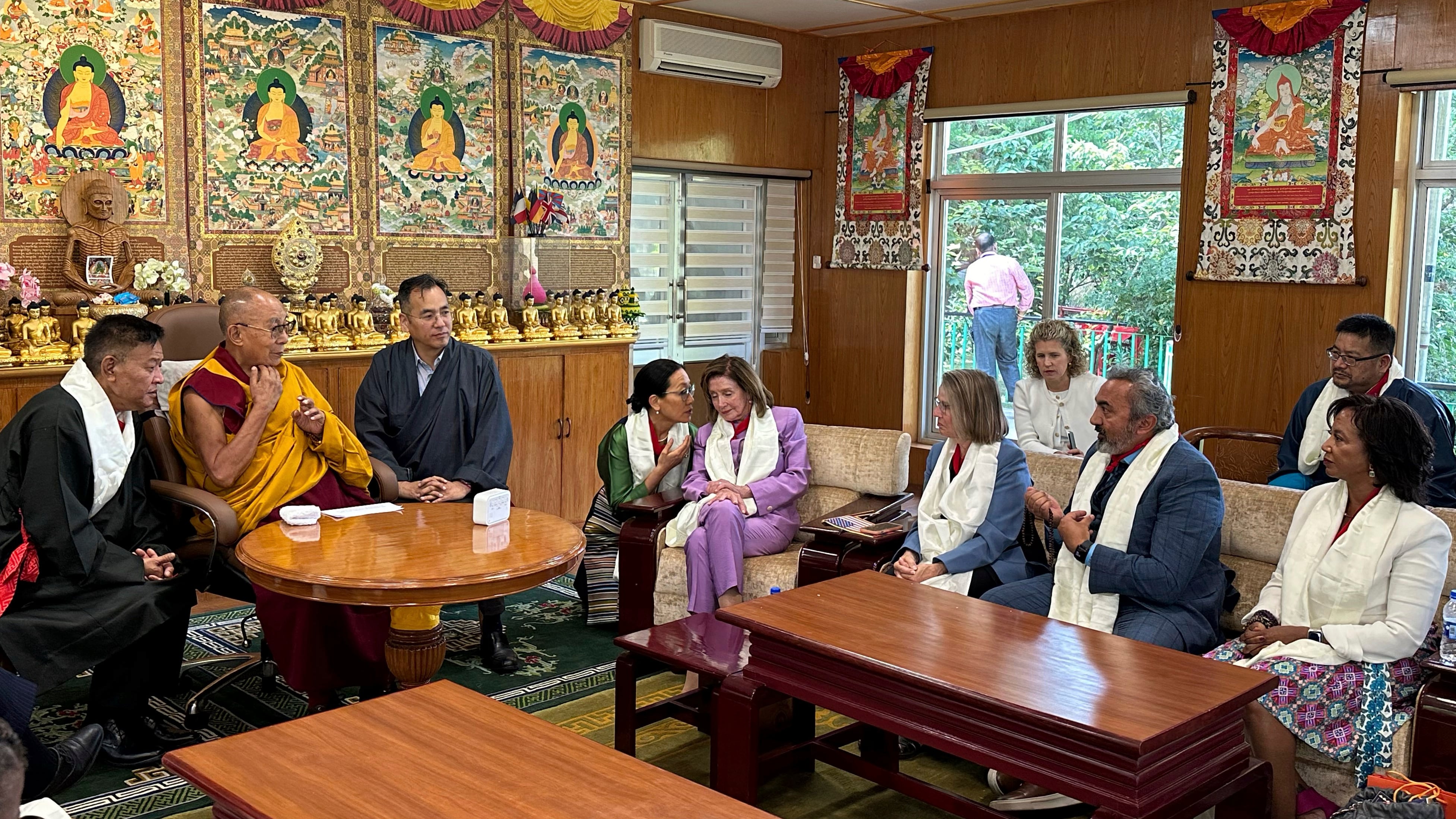 The US team spoke to the exiled Tibetan spiritual leader (Leslie Shedd via AP)