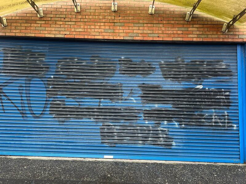 Racist graffiti scrawled on shutters early on Friday 