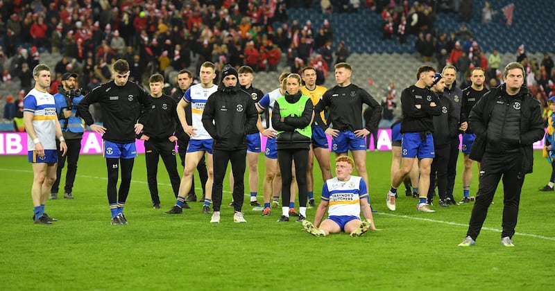 Thomas Canavan (left) and dejected Errigal Ciaran players after the All-Ireland Club Senior Championship final at Croke Park. Picture Oliver McVeigh