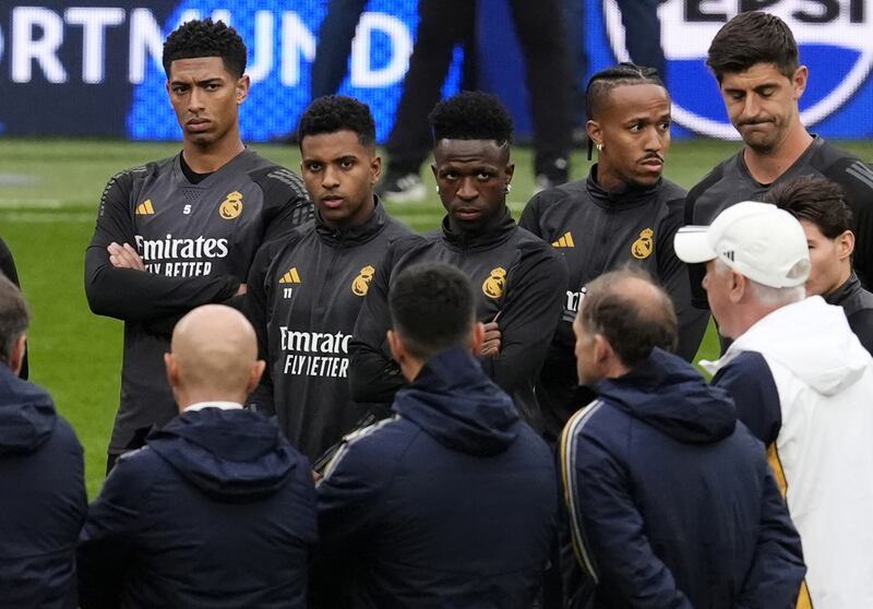 Real Madrid’s Jude Bellingham and his team mates team talk with manager Carlo Ancelotti during a training session at Wembley.