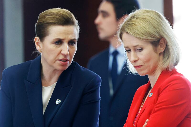 Denmark’s Prime Minister Mette Frederiksen, left, spoke to European Union foreign policy chief Kaja Kallas at a round table meeting during an EU summit in Brussels (AP)