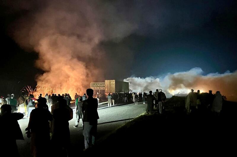 Shells were fired by police officers in an attempt to disperse activists during a rally demanding Imran Khan’s release (Maaz Awan/AP)