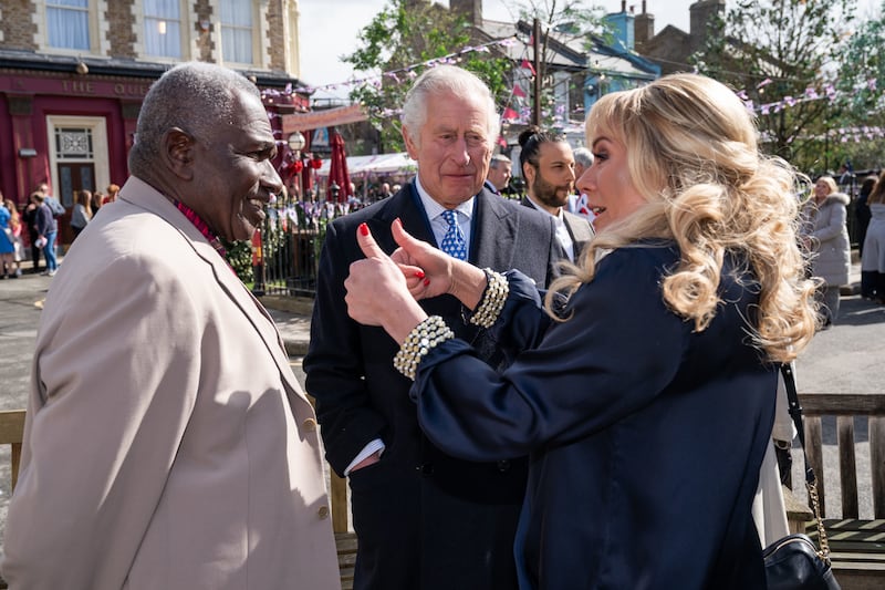 The Prince of Wales with Letitia Dean and Rudolph Walker during a visit to the set of EastEnders at the BBC studios in Elstree, Hertfordshire