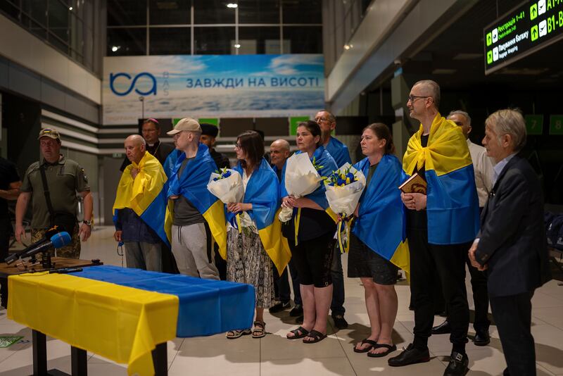 Some of the prisoners who were released at Kyiv Airport, Ukraine (Alex Babenko/AP)
