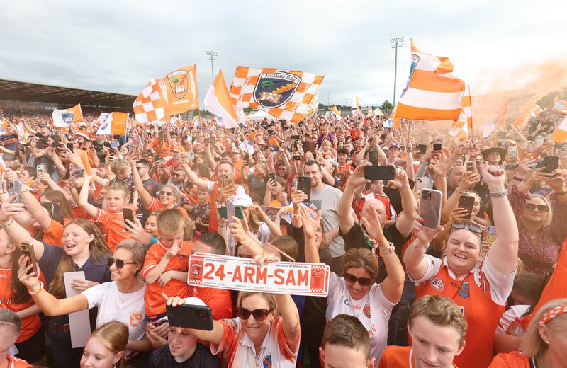 Armagh celebrate  with the fans at the Athletic grounds in Armagh on Monday, after winning the All Ireland.
PICTURE COLM LENAGHAN