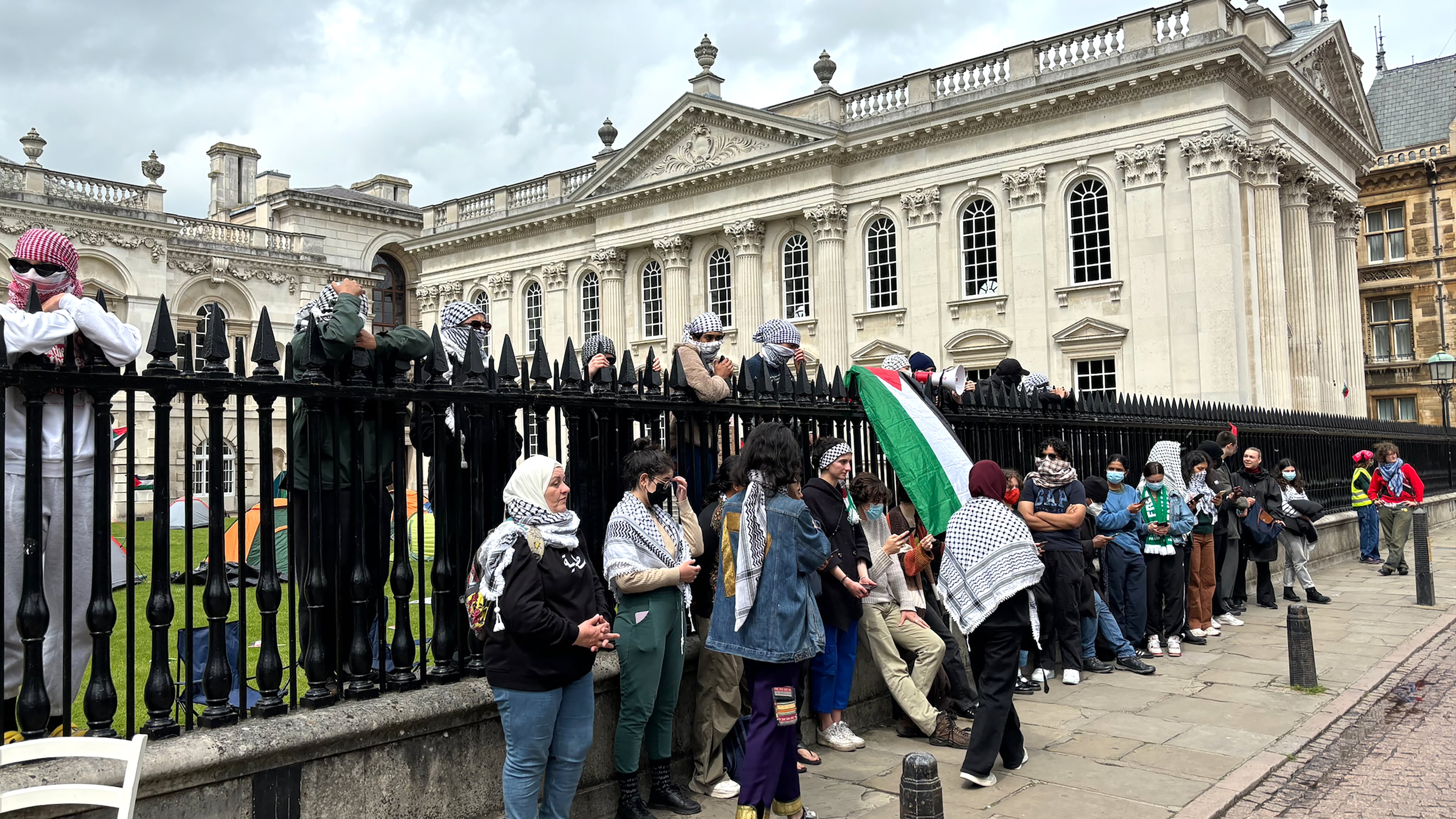 People take part in a protest over the Gaza conflict outside Senate House at Cambridge University