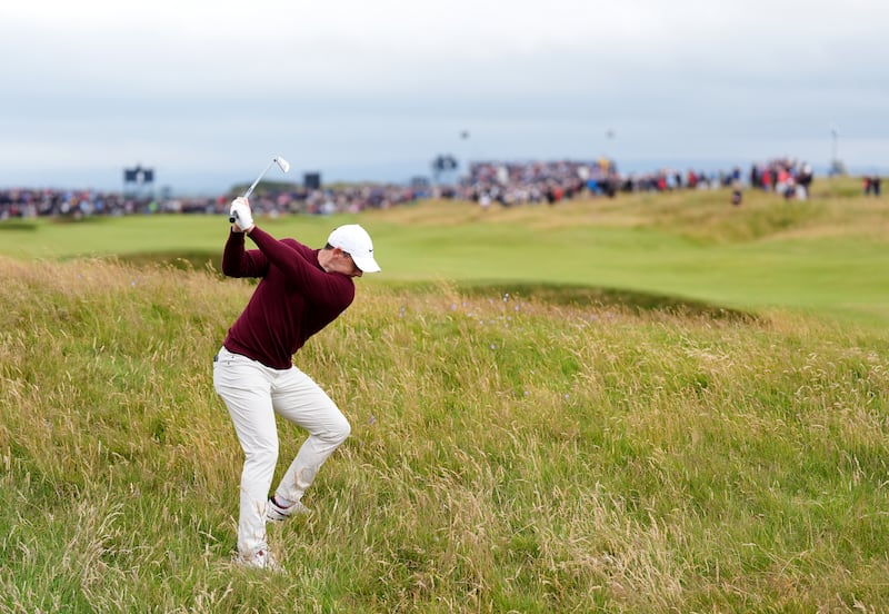 Northern Ireland’s Rory McIlroy in the rough on the 4th during day two of The Open at Royal Troon