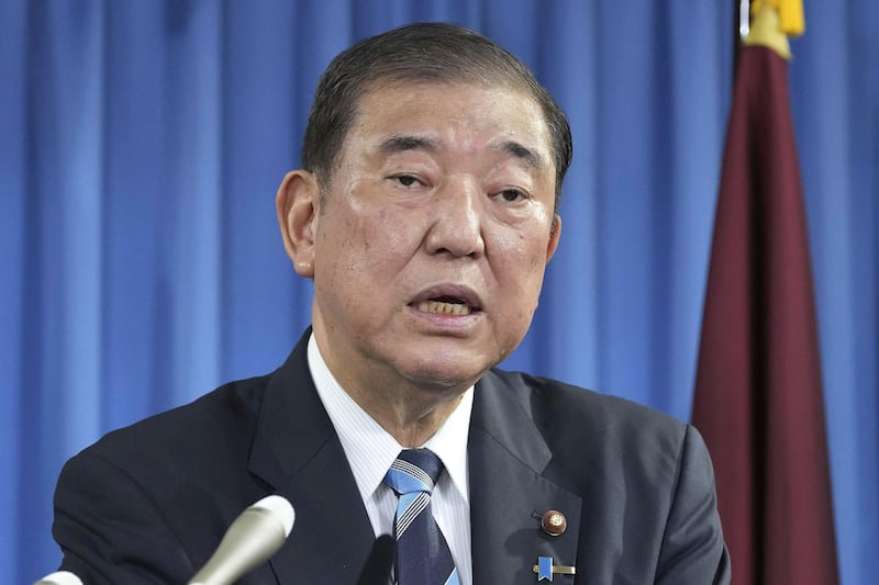 Shigeru Ishiba, the head of Japan’s governing party, the Liberal Democratic Party speaks during a press conference at the party’s headquarters in Tokyo (Kyodo News via AP)