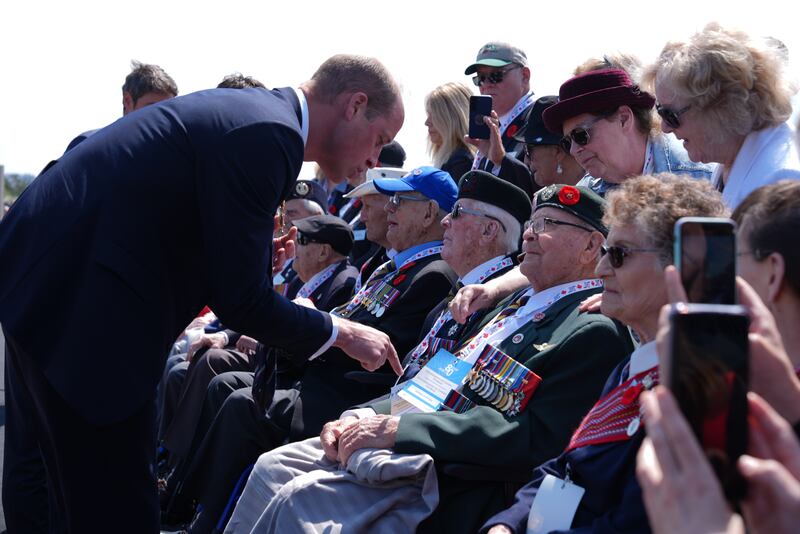 The Prince of Wales speaks to veterans at the Government of Canada ceremony to mark the 80th anniversary of D-Day