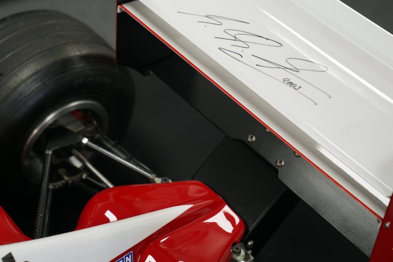 Michael Schumacher signed the rear spoiler of the remote-controlled car