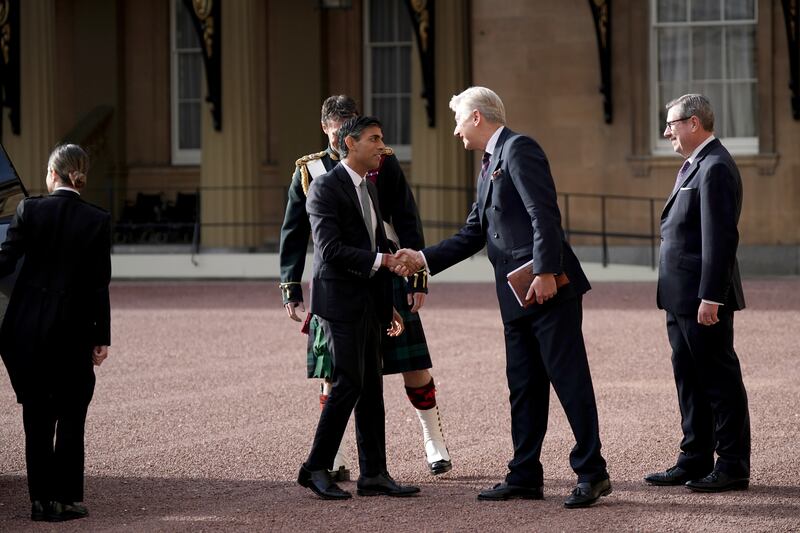 Rishi Sunak arrives at Buckingham Palace in October 2022 for an audience with the King where he was invited to become prime minister
