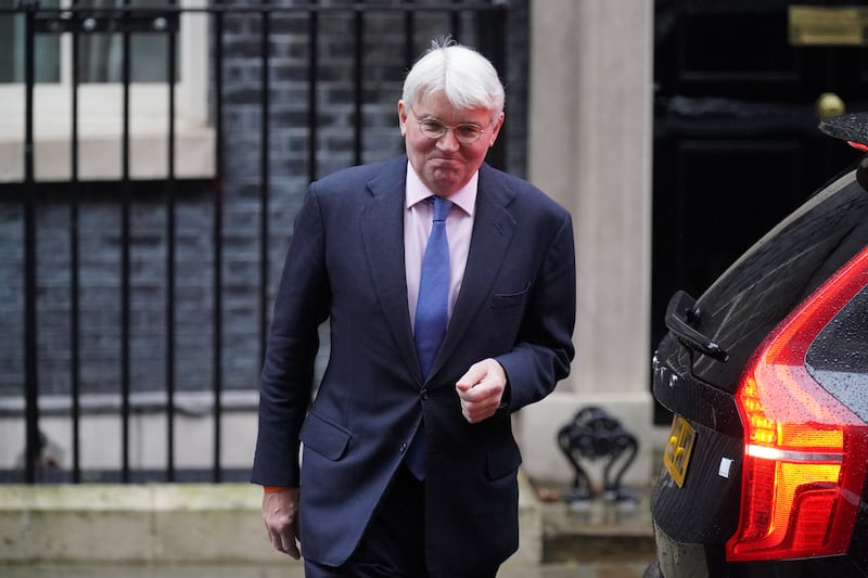 Foreign Office minister Andrew Mitchell leaving 10 Downing Street