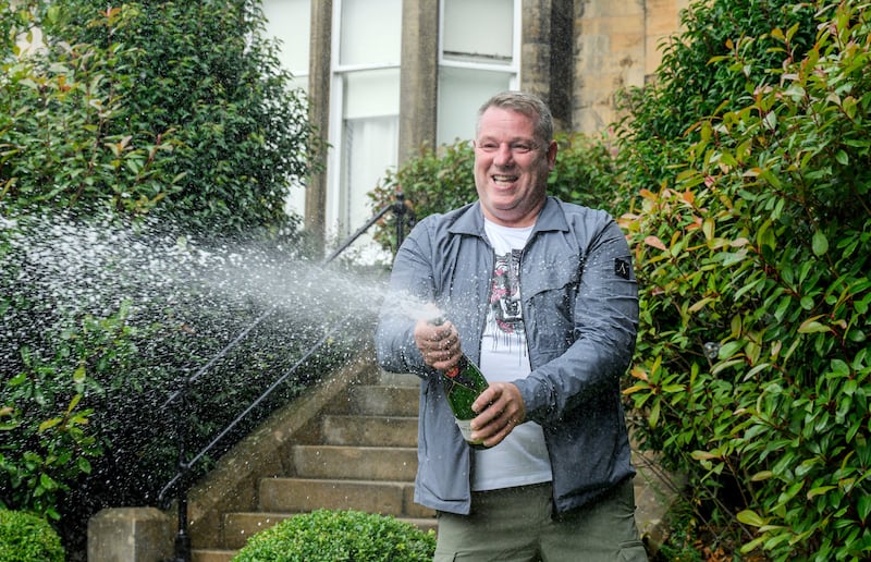 John McDowell celebrates his National Lottery winnings .