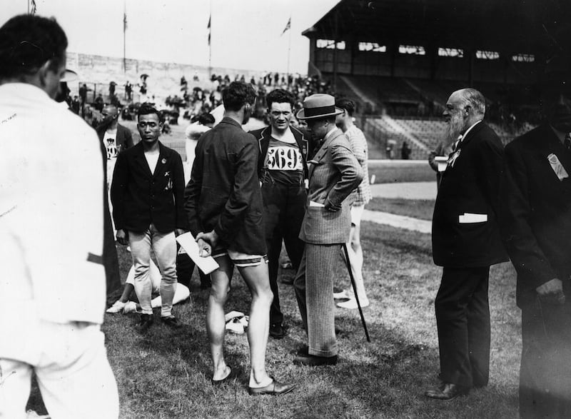 The then Prince of Wales, later Edward VIII, talks to Irish athlete Sean Lavan during the Olympic Games at the Colombes Stadium in Paris in July 1924. Picture: Central Press/Getty Images