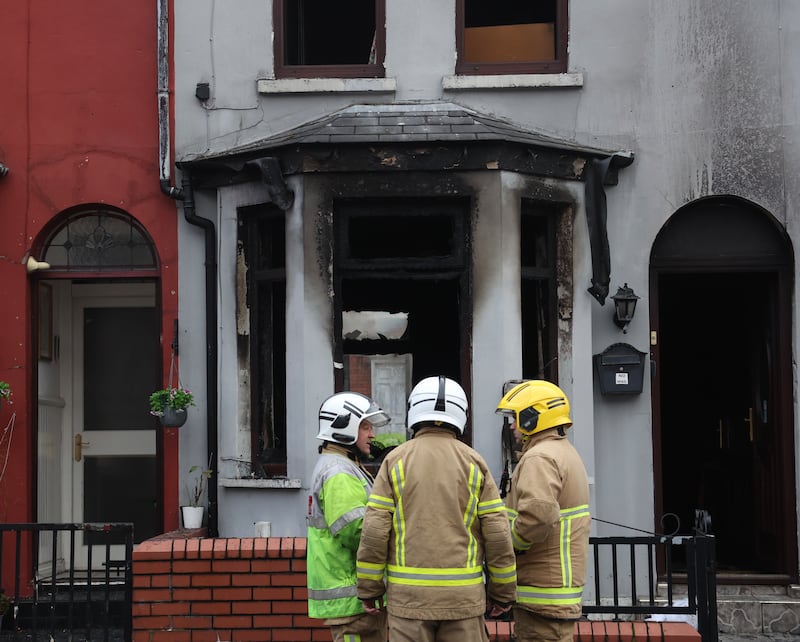 Emergency services at the scene after a house fire on Cavendish street west Belfast.PICTURE COLM LENAGHAN