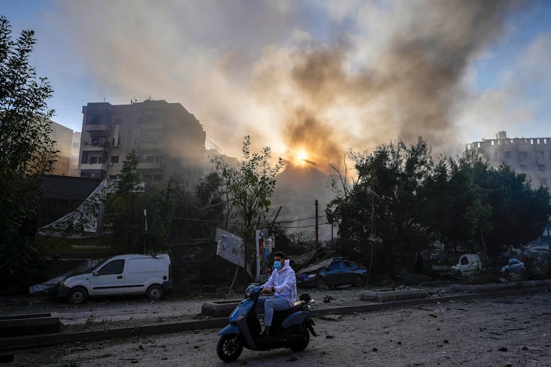 Smoke rises from the site of an Israeli airstrike in Dahiyeh, Beirut, on Thursday (Hassan Ammar/AP)