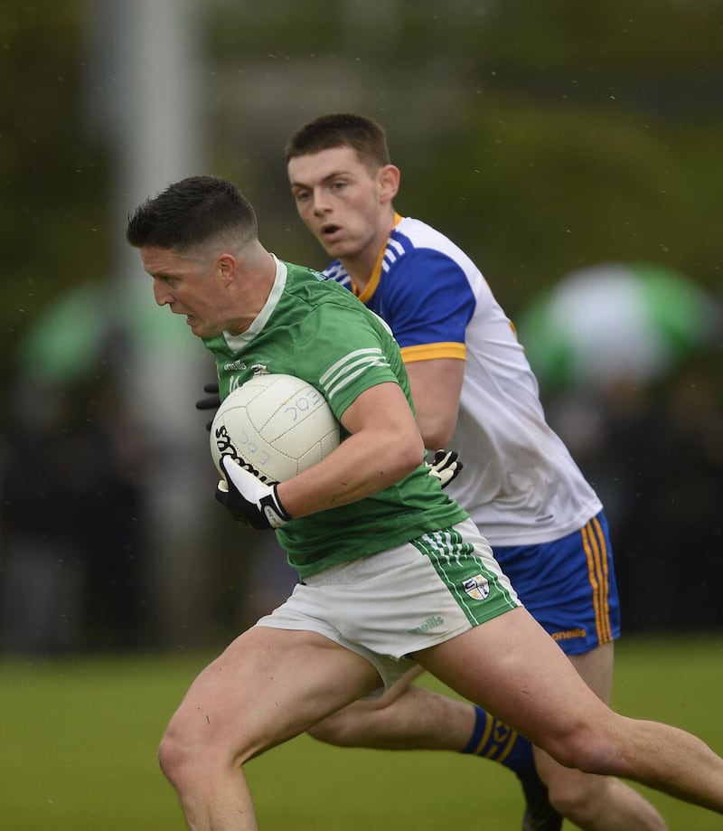 Tomas McCann takes on Matthew Downey during Cargin's win over St Brigid's. Picture: Mark Marlow