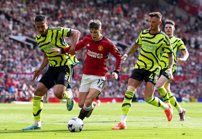 William Saliba, left, helped Arsenal keep a clean sheet at Old Trafford