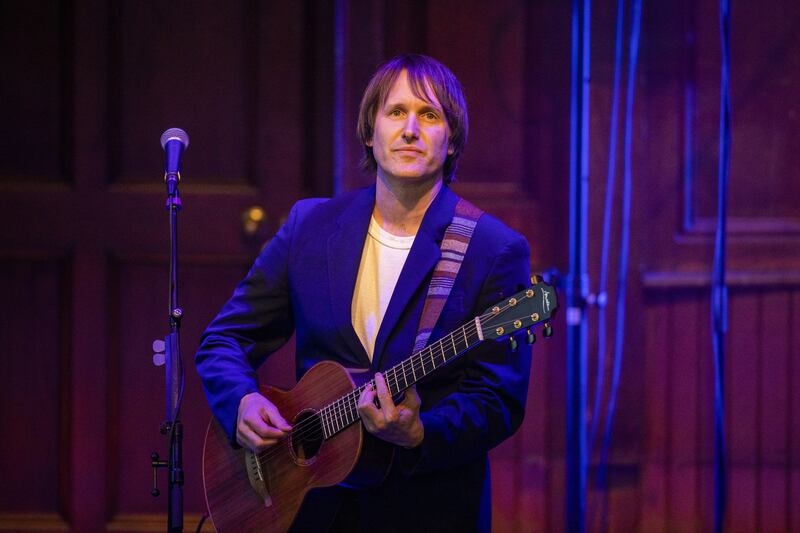 Tim Wheeler of Ash performs the song Shining Light, dedicated to Lyra McKee on the anniversary of her murder, before former US president Bill Clinton gives a speech at a posthumous tribute for two of the main architects of the Good Friday Agreement, the late John Hume and former first minister of Northern Ireland David Trimble, in the Guildhall in Londonderry.