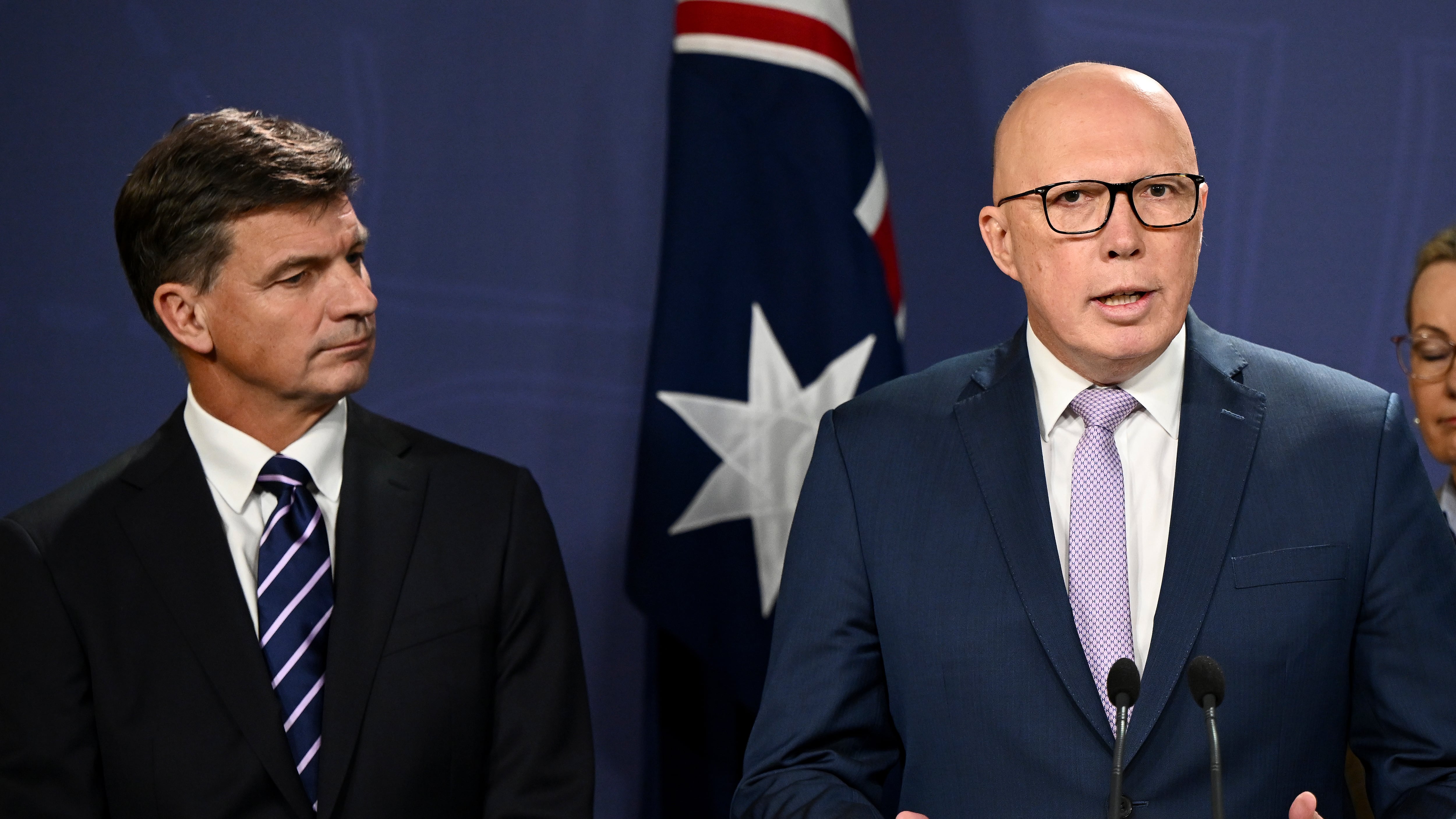 Opposition Leader Peter Dutton unveils details of proposed nuclear energy plan as Shadow Treasurer Angus Taylor, left, looks on during a press conference (Bianca de Marchi/AP)