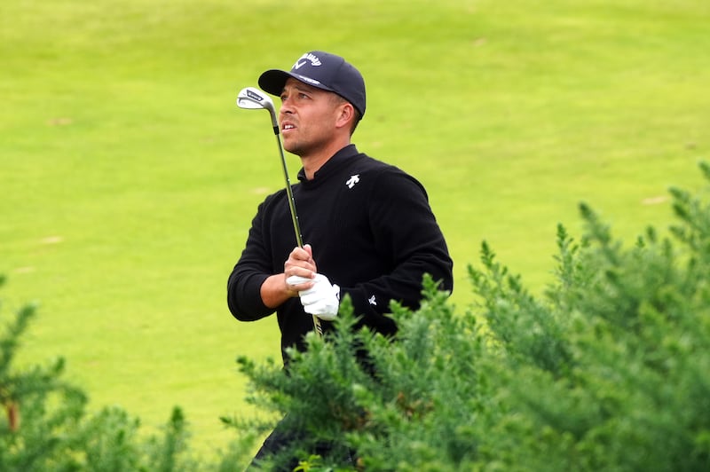 Xander Schauffele plays from the 11th fairway to set up a crucial birdie during day four of The 152nd Open at Royal Troon