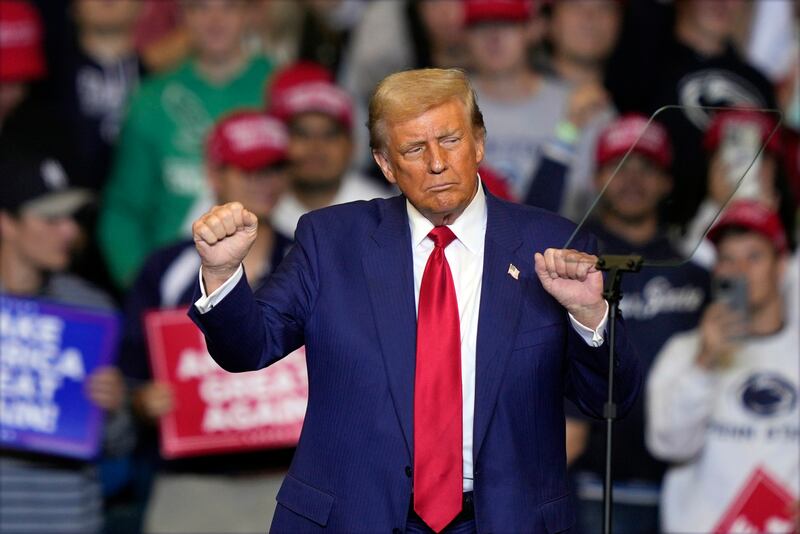 Donald Trump dancing during a campaign rally at the Bryce Jordan Centre, Pennsylvania, on Saturday (Matt Rourke/AP)