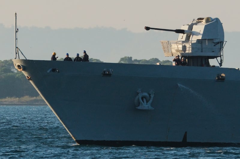 The Italian navy ship Libra arrives at the port of Shengjin carrying the first group of migrants who were intercepted in international waters (Vlasov Sulaj/AP)