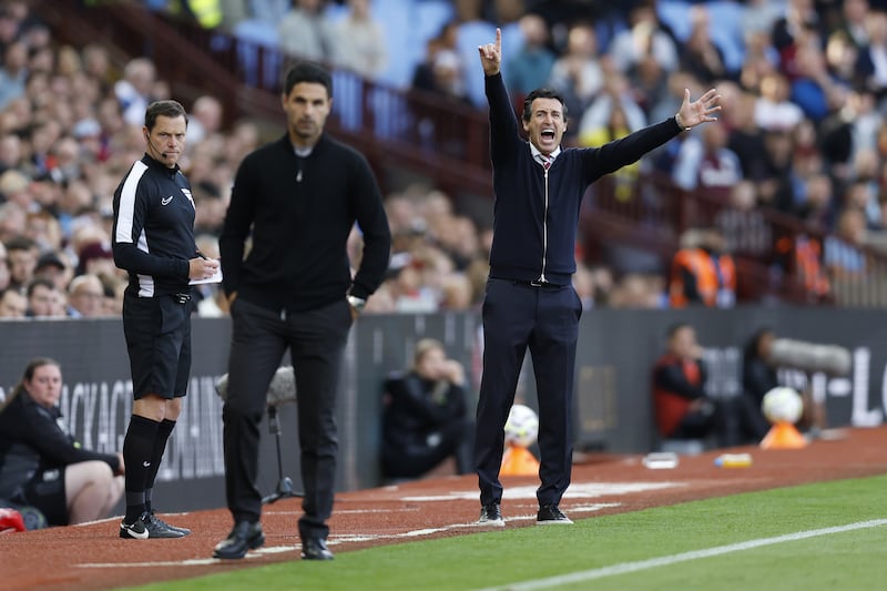 Unai Emery, right, suffered defeat to his former club